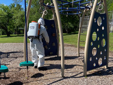 Liberty Services Decon sanitizes Clayton playground equipment